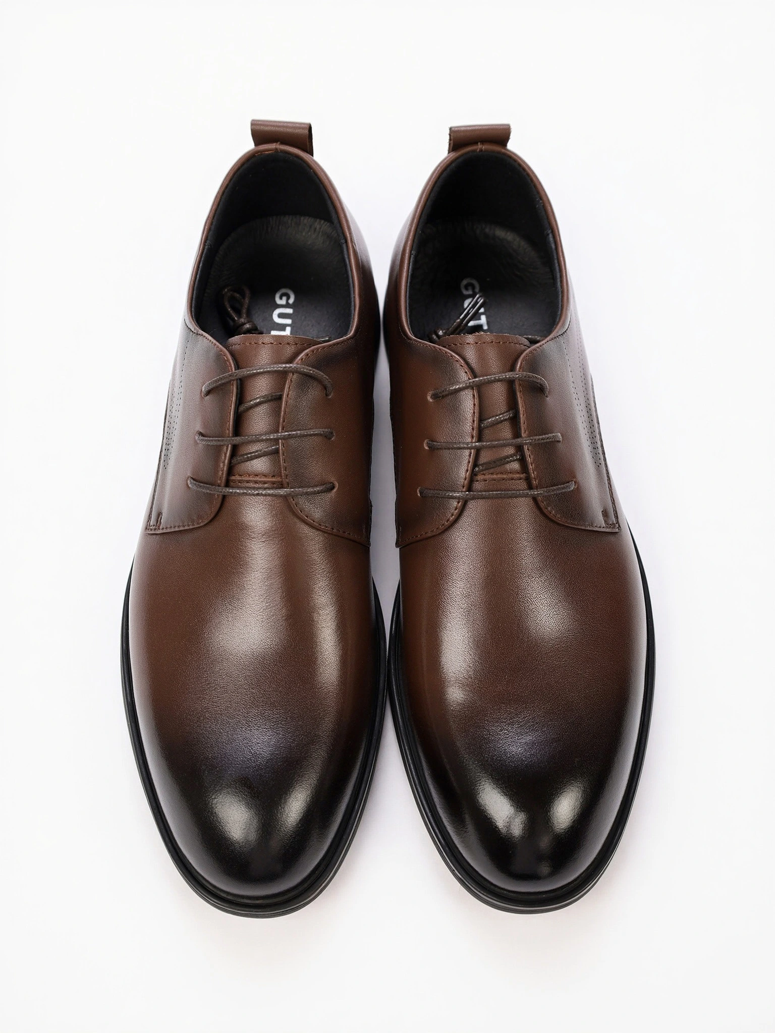 Туфли-дерби коричневого цвета на низком каблуке